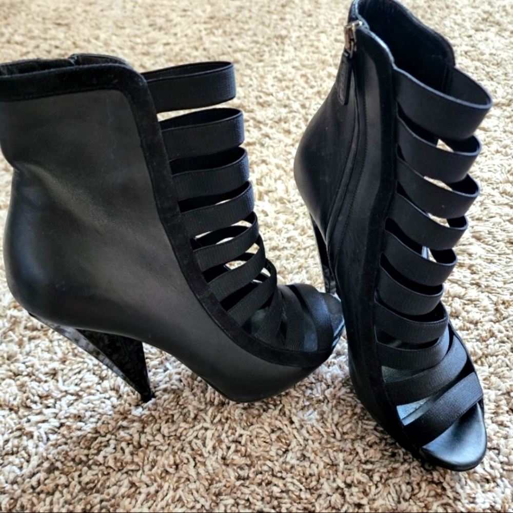 Gucci Olimpia cone heel caged bootie.